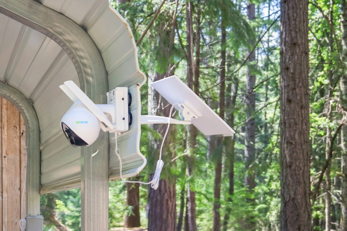 Connected Camera on a house exterior with trees in the background